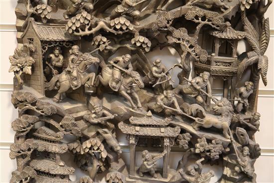 Four Chinese carved giltwood panels of battle scenes